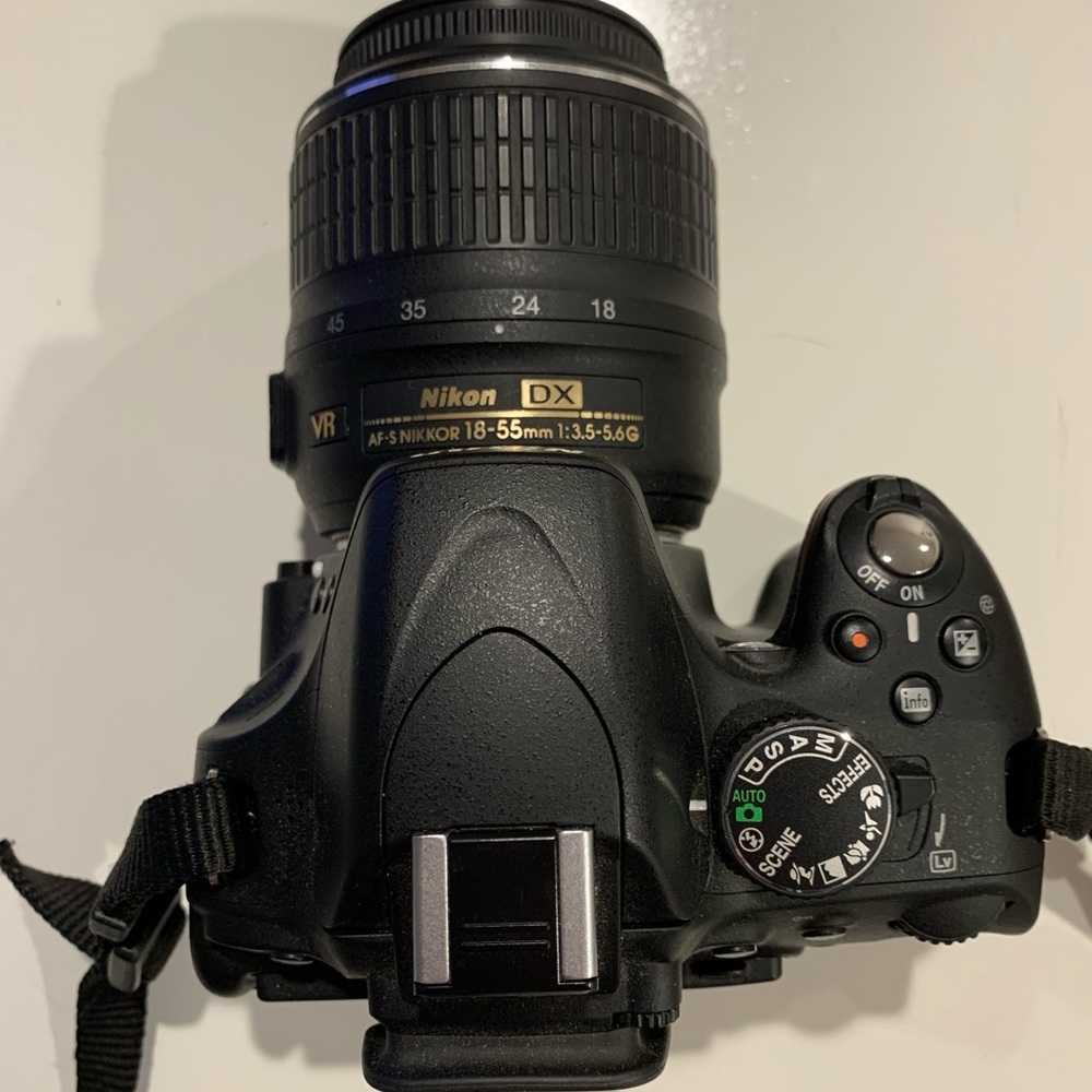 Nikon D5100 with lens kit 18-55mm
